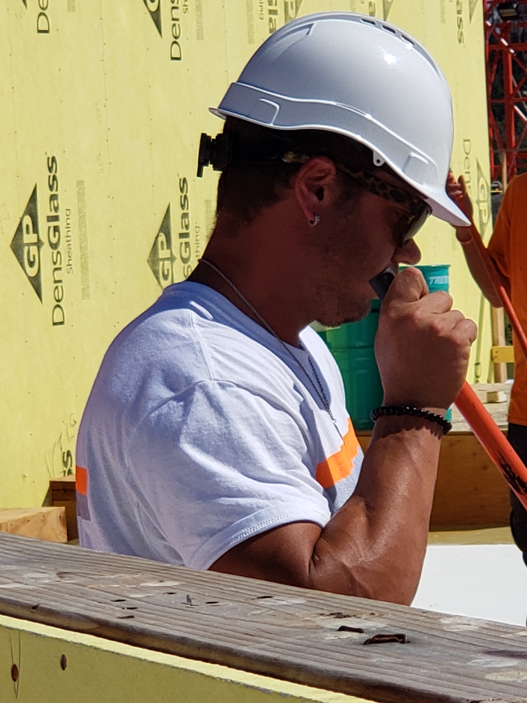 Seamcraft crew member on a rooftop job site